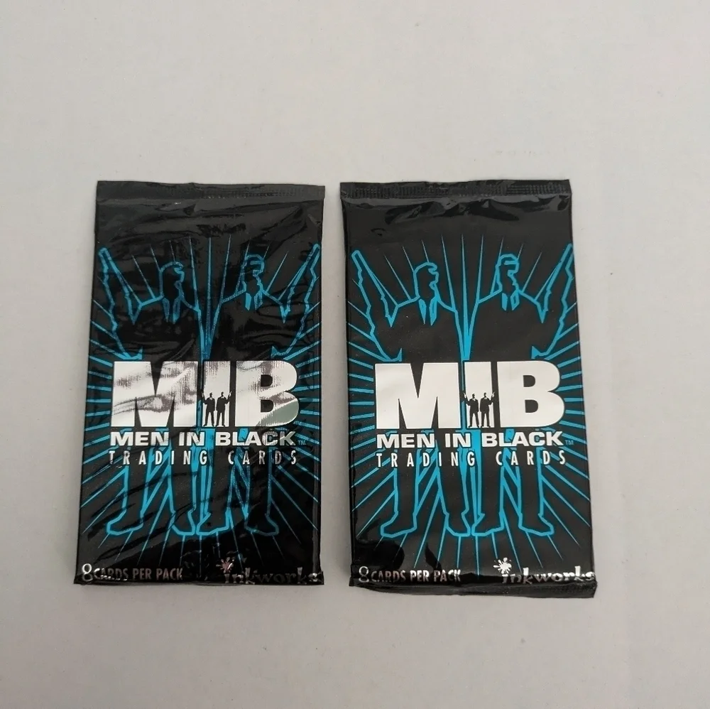 Men in Black trading cards, dated 1997. 2 packs unopened.